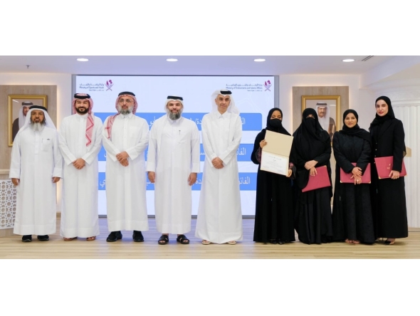 Undersecretary of the Ministry of Awqaf and Islamic Affairs H E Dr. Sheikh Khalid bin Mohammed bin Ghanem Al Thani and Undersecretary of the Ministry of Sports and Youth H E Eng. Yasser bin Abdullah Al Jamal with other officials and award winners. 