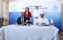 Minister of State for Foreign Trade Affairs, H E Dr. Ahmad Al Sayed and Federal Minister for Economy and Energy of Germany, H E Dr. Katherina Reiche, look on as officials sign MoU.