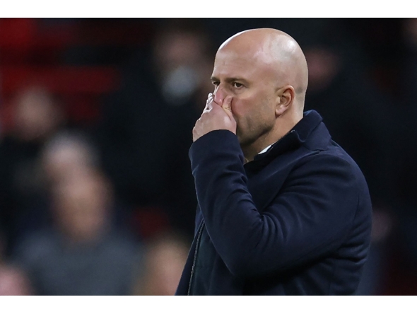 Liverpool's Dutch manager Arne Slot reacts during the English Premier League football match between Liverpool and Nottingham Forest at Anfield in Liverpool, north west England on November 22, 2025. (Photo by Darren Staples / AFP)