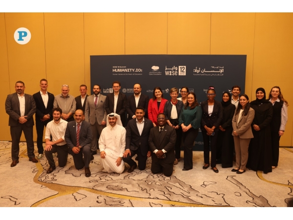 WISE officials along with WISE Awards finalists. Pictures: Amr Diab / The Peninsula