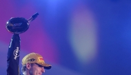 Race winner Max Verstappen of the Netherlands and Oracle Red Bull Racing lifts his trophy on the podium during the F1 Grand Prix of Las Vegas at Las Vegas Strip Circuit on November 22, 2025 in Las Vegas, Nevada. Hector Vivas/Getty Images/AFP