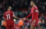 Liverpool's Dutch defender Virgil Van Dijk and Liverpool's Egyptian striker Mohamed Salah react at the end of their loss during the English Premier League football match between Liverpool and Nottingham Forest at Anfield in Liverpool, north west England on November 22, 2025. (Photo by Darren Staples / AFP)