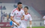 Al Shamal's Mohamed Al-Mannai (left) celebrates with teammate Omar Rafik Mohamed.