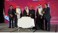 Minister of Awqaf and Islamic Affairs H E Ghanem bin Shaheen bin Ghanem Al Ghanim; Minister of State H E Eng. Essa bin Hilal Al Kuwari; Ambassador of Indonesia H E Ridwan Hassan; and other dignitaries cutting a cake to mark the 80th Independence Day of Indonesia in Doha yesterday. 