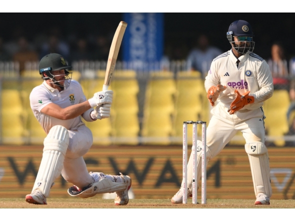 South Africa's Tristan Stubbs plays a shot during the fourth day of the second Test cricket match between India and South Africa at the Barsapara Cricket Stadium in Guwahati on November 25, 2025. (Photo by Biju Boro / AFP) 