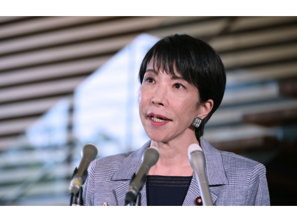 Japan's Prime Minister Sanae Takaichi answers questions from reporters about her telephone talks with US President Donald Trump at the Prime Minister's Office in Tokyo on November 25, 2025. (Photo by JIJI Press / AFP) 