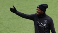 Paris Saint-Germain's French forward Ousmane Dembele gestures during a training session at the Campus Paris Saint-Germain in Poissy, in the western outskirts of Paris, on November 25, 2025, on the eve of the UEFA Champions League first round day 5 football match between Paris Saint-Germain and Tottenham Hotspur. (Photo by FRANCK FIFE / AFP)