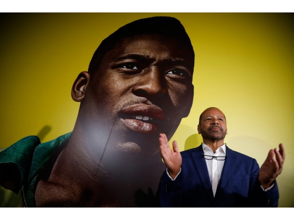 Neymar Santos SR, father of Brazilian forward Neymar Jr and owner of NR Sports, gestures to the media at the announcement of the acquisition of late Brazilian football legend Pele brand at the Pele Museum, in Santos, Sao Paulo, Brazil on November 25, 2025. (Photo by Miguel SCHINCARIOL / AFP)