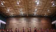 Students of Nippon Sports Science University rehearse for their annual synchronised walking performance, known as Shudankodo, in Yokohama on November 26, 2025. (Photo by Greg Baker / AFP)
