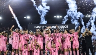 Lionel Messi #10 of Inter Miami CF and teammates lift the Champion's trophy after winning the the Audi 2025 MLS Cup western conference final match between Inter Miami CF and New York City FC at Chase Stadium on November 29, 2025 in Fort Lauderdale, Florida. Carmen Mandato/Getty Images/AFP