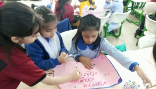 PISQ KG and Primary Wings students during celebrations.