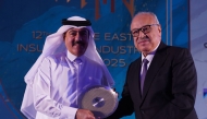 QIIG Group President, Ali Ibrahim Al-Abdulghani receiving the award.