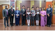Birla Public School principal and staff with the winning students. 