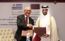 Minister of Municipality H E Abdullah bin Hamad bin Abdullah Al Attiyah and Minister of Foreign Affairs of the Oriental Republic of Uruguay H E Mario Lubetkin exchange documents after signing the MoU. 
