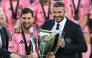 File photo of Inter Miami's Argentine forward #10 Lionel Messi (L) poses with the trophy next to the team's owner David Beckham (R) after winning the Major League Soccer (MLS) Cup final between Inter Miami and the Vancouver Whitecaps at Chase Stadium in Fort Lauderdale, Florida, on December 6, 2025.