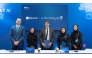 Representatives of the MCIT and Microsoft at the signing ceremony. 