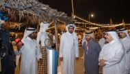 Minister of Environment and Climate Change H E Dr. Abdullah bin Abdulaziz bin Turki Al-Subaie and General Manager of the Katara Cultural Village Foundation Professor Dr. Khalid bin Ibrahim Al-Sulaiti visiting the festival.