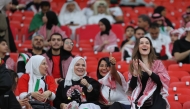 Fans cheer during the FIFA Arab Cup semi-final between Jordan and Saudi Arabia at Al Bayt Stadium on Monday.