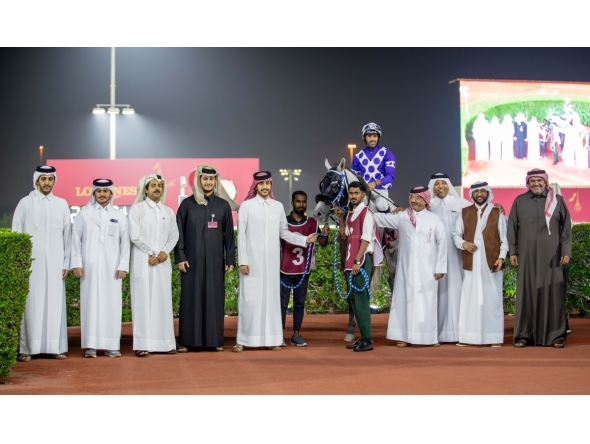 The connections of Naseeb Zakhir celebrate after the Osama Omer Al-Dafea-owned grey colt won the Zekreet Cup. PICTURES: JUHAIM/QREC