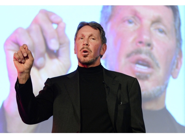 Larry Ellison, CEO of Oracle Corporation, gestures as he makes a speech during the New Economy Summit 2014 in Tokyo on April 9, 2014. Photo by TORU YAMANAKA / AFP