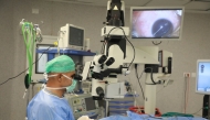 An eye surgeon performing surgery in an operating room in Gaza.