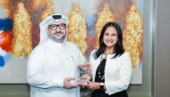 A Commercial Bank official receiving the award.