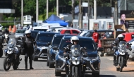The Federal Police convoy carrying former Brazil president (2029-2023) Jair Bolsonaro, heads to the DF Star Hospital where he will undergo hernia surgery, in Brasillia. (Photo by Evaristo Sa / AFP)
