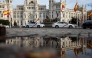 File: A picture taken on October 31, 2024 shows the Spanish flag flying at half-mast at the start of three days of national mourning after Spain's deadliest floods in decades, at Cibeles Square in Madrid. (Photo by Oscar Del Pozo / AFP)
