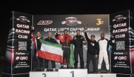 Podium winners celebrate after the third round of Qatar Drift Championship.