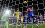Tottenham's  Archie Gray (centre) heads in the opening goal against Crystal Palace. 