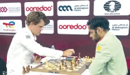 Norway's Magnus Carlsen makes his last move against India's Arjun Erigaisi.
