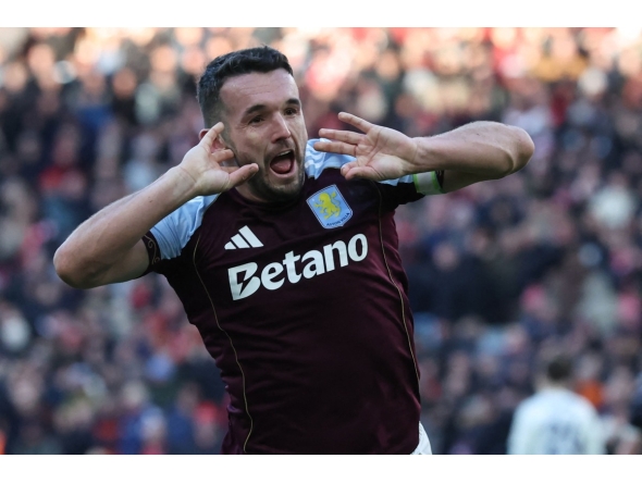 Aston Villa's Scottish midfielder John McGinn celebrates after scoring their third goal during the English Premier League football match between Aston Villa and Nottingham Forest at Villa Park in Birmingham, central England on January 3, 2026. (Photo by Darren Staples / AFP) 