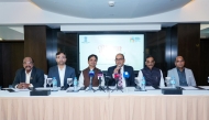 Ambassador of India to Qatar H E Vipul with other officials addressing a press conference. 