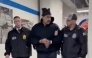 This screengrab taken from the X account of Rapid Response 47, the official White House rapid response account, shows Venezuelan President Nicolas Maduro (C) escorted by DEA agents inside the headquarters of the US Drug Enforcement Administration (DEA) in lower Manhattan, New York, on January 3, 2026. (Photo by X account of Rapid Response 47 / AFP)