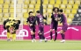 Al Sadd's Akram Afif (second right) celebrates with teammates after scoring a goal.