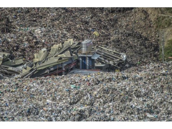 An aerial view shows a landslide at the landfill in Barangay Binaliw, Cebu City on January 9, 2026. Photo by Alan Tangcawan / AFP
