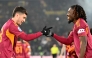 Roma's Argentine forward #18 Matias Soule (L) celebrates after scoring his team's second goal with Roma's French midfielder #17 Manu Kone (R) during the Italian Serie A football match between As Roma and Sassuolo at the Olympic stadium in Rome on January 10, 2026. (Photo by Alberto PIZZOLI / AFP)