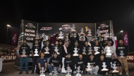 QRC Director General Sheikh Jabor bin Khalid Al Thani with the podium winners after the first round.