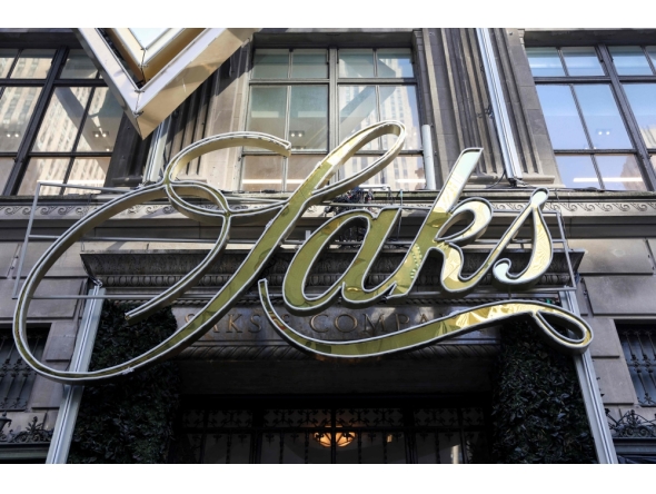 An exterior view of signage at the Saks Fifth Avenue department store in New York on January 13, 2026. (Photo by Angela Weiss / AFP)
 
