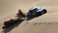 Qatari driver Nasser Al Attiyah  competes in Stage 10. (AFP)
