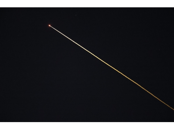 The SpaceX Dragon capsule Crew 11 returns early to Earth from space due to an astronaut's medical issue as seen during reentry over Los Angeles, California on January 15, 2026. (Photo by Patrick T. Fallon / AFP)