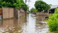 This photo shows a view of the flood-affected Machava area in Matola City, Maputo Province, Mozambique, Jan. 12, 2026. Mozambique is currently in the peak of its rainy season, a period marked by frequent alerts for heavy rains and strong winds, particularly in the central and southern regions. (Photo by Mendes Mondlane/Xinhua)