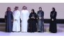 Minister of Education and Higher Education H E Lolwah bint Rashid bin Mohammed Al Khater honouring the representative of a private school for participating in the “Community Responsibility of Private Schools and Kindergartens” project.