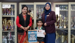 Principal Dr. Hameeda Kadar (left) with the child prodigy. 