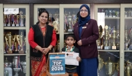 Principal Dr. Hameeda Kadar (left) with the child prodigy. 
