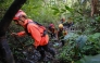 Joint search and rescue teams climb towards the suspected crash site of an Indonesia Air Transport turboprop plane that lost contact a day earlier while flying from Yogyakarta to Makassar, in the Bulusaraung Mountains, South Sulawesi, Indonesia, January 18, 2026. Photo by Muchtamir / AFP