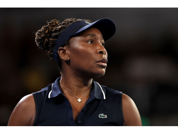 USA's Venus Williams reacts on a point to Serbia痴 Olga Danilovic during their women's singles match on day one of the Australian Open tennis tournament in Melbourne on January 18, 2026. (Photo by Martin KEEP / AFP)
