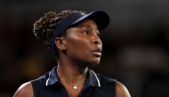 USA's Venus Williams reacts on a point to Serbia痴 Olga Danilovic during their women's singles match on day one of the Australian Open tennis tournament in Melbourne on January 18, 2026. (Photo by Martin KEEP / AFP)