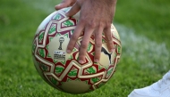 The golden ball, specially made for the final is seen ahead of a training session in Rabat on January 17, 2026, on the eve of the Africa Cup of Nations (CAN) final football match between Senegal and Morocco. (Photo by Sebastien Bozon / AFP)