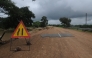 A general view of a damaged road on the way from Giyani to Mbaula on January 17, 2026 following heavy rains over much of the Limpopo Province, South Africa (Photo by LUCAS LEDWABA / AFP)
